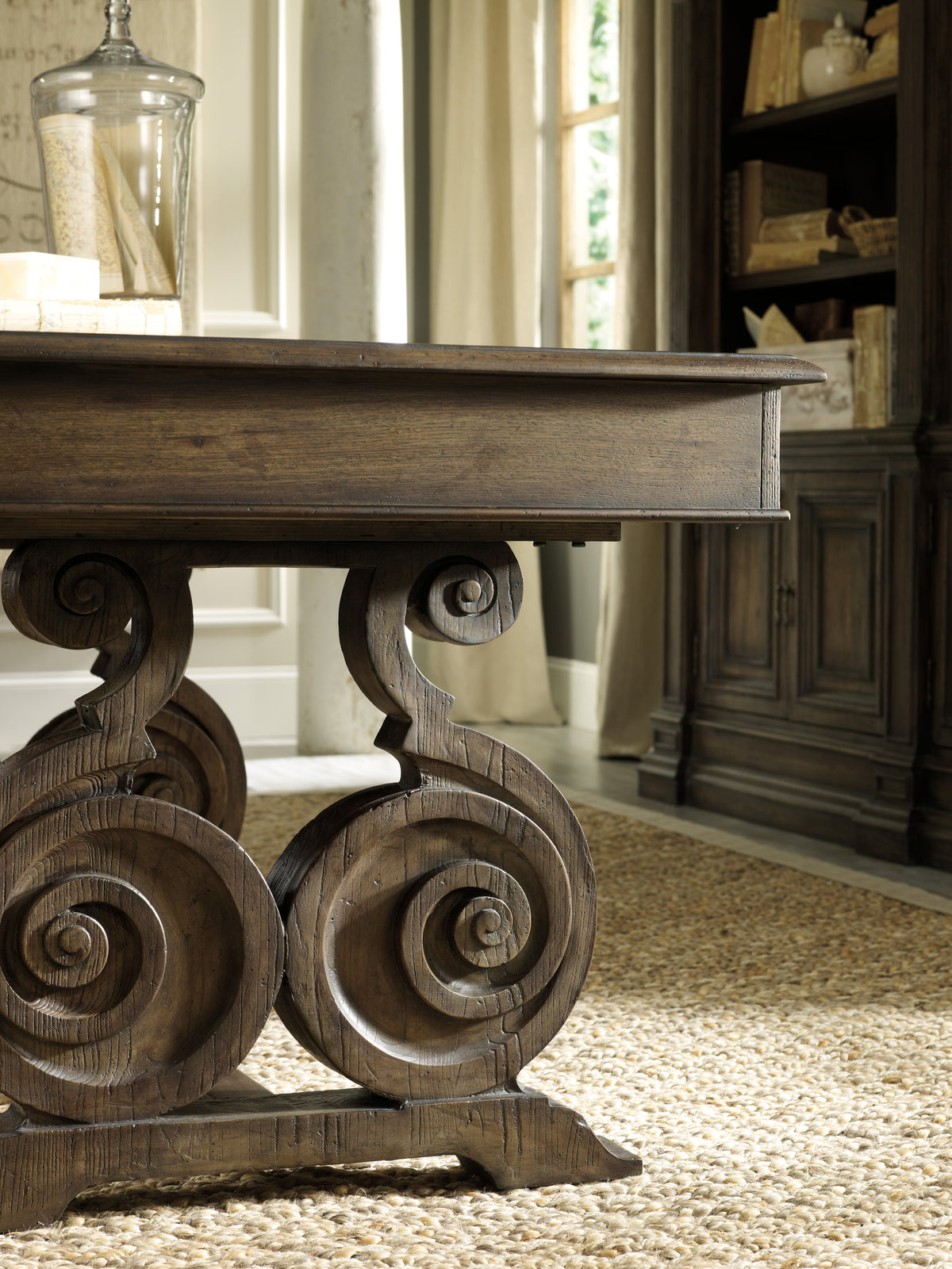 a wooden table with spiral designs