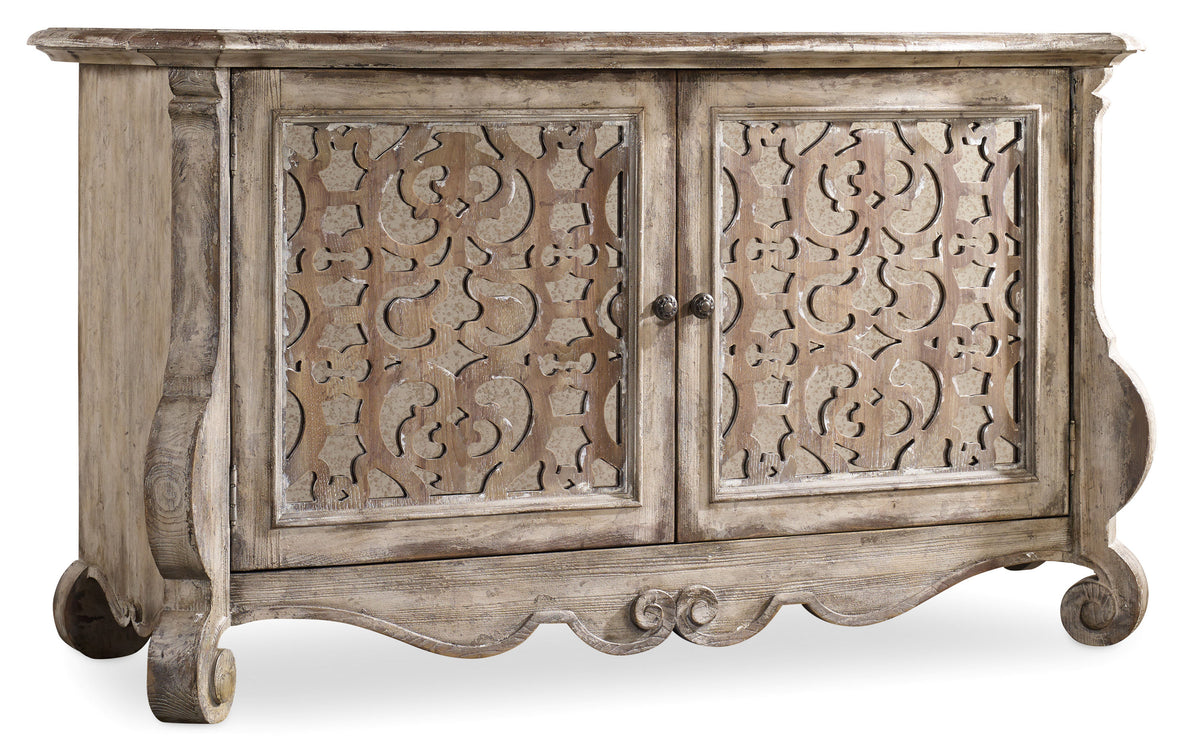 a wooden cabinet with a carved design