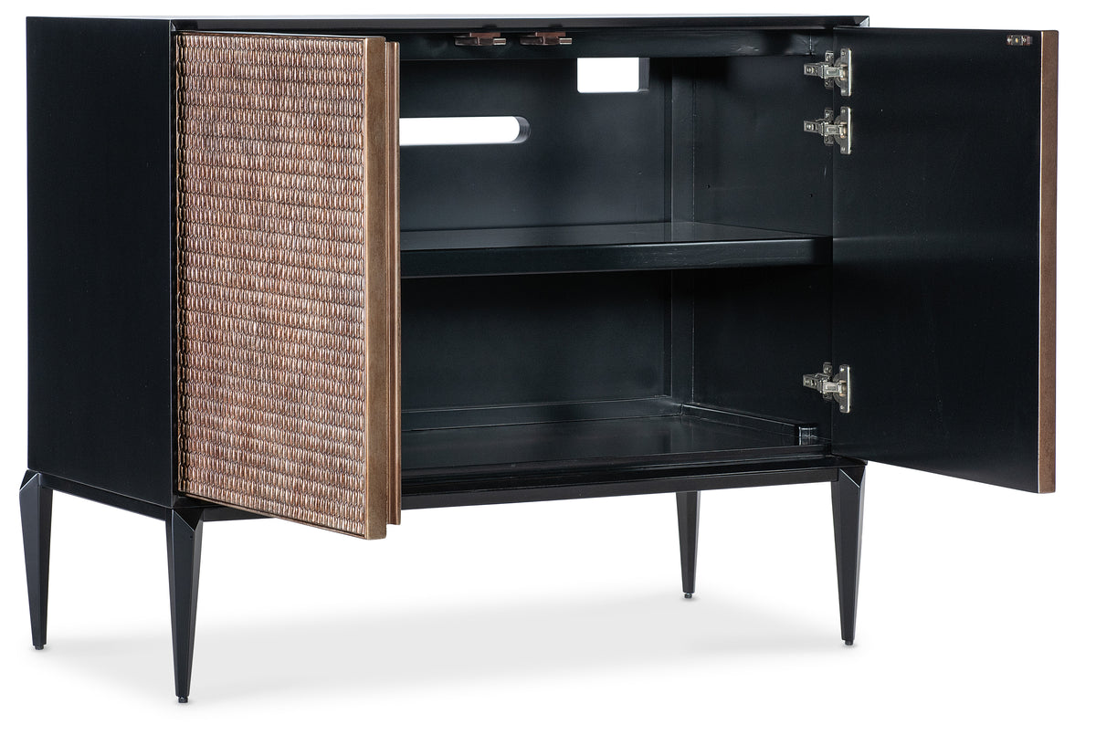 a black cabinet with a door open