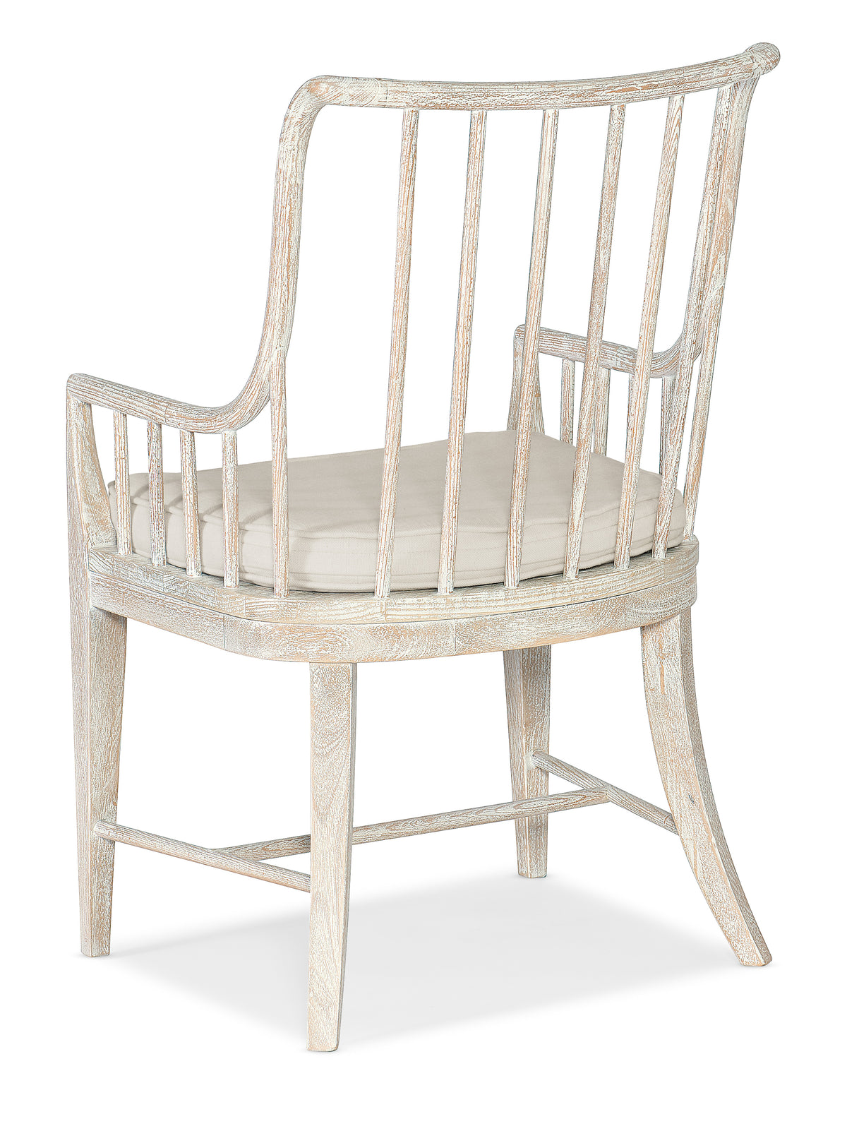 a white chair with a cushion
