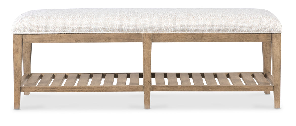 a bench with a white cushion