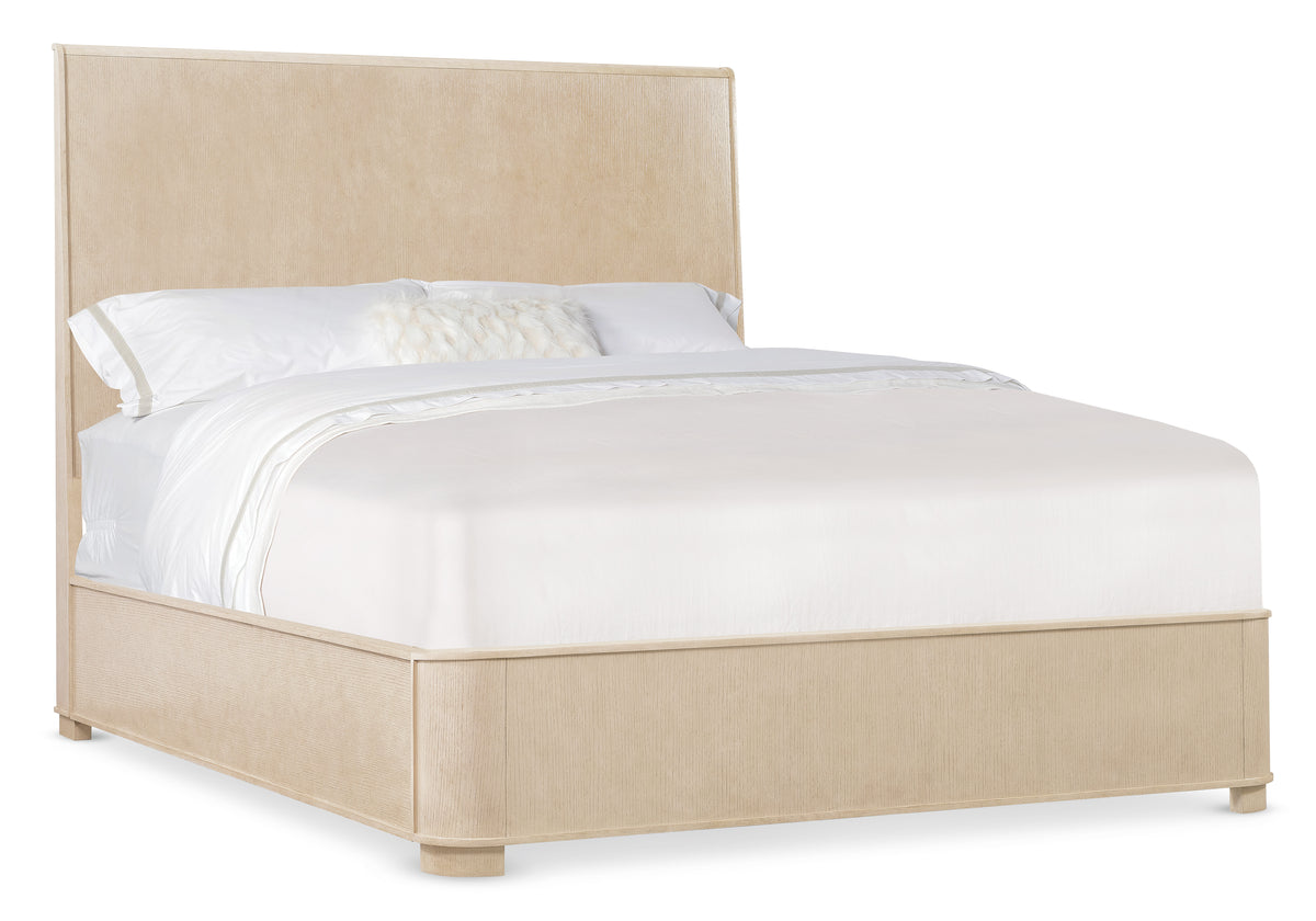 a bed with a white bed frame