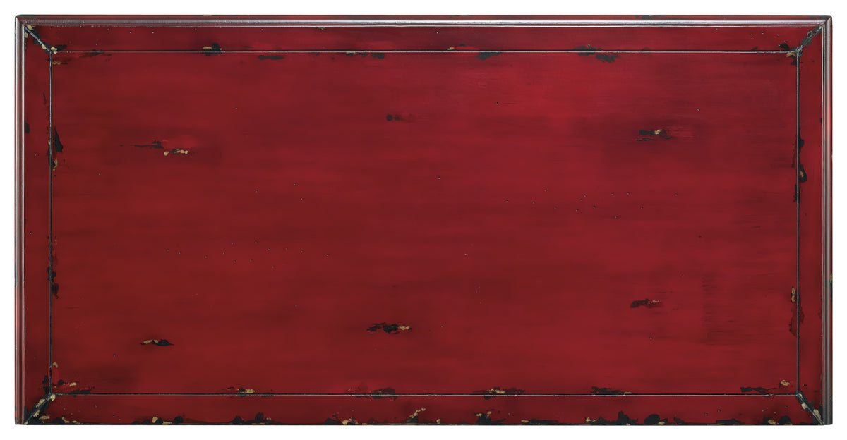 a red rectangular object with black edges