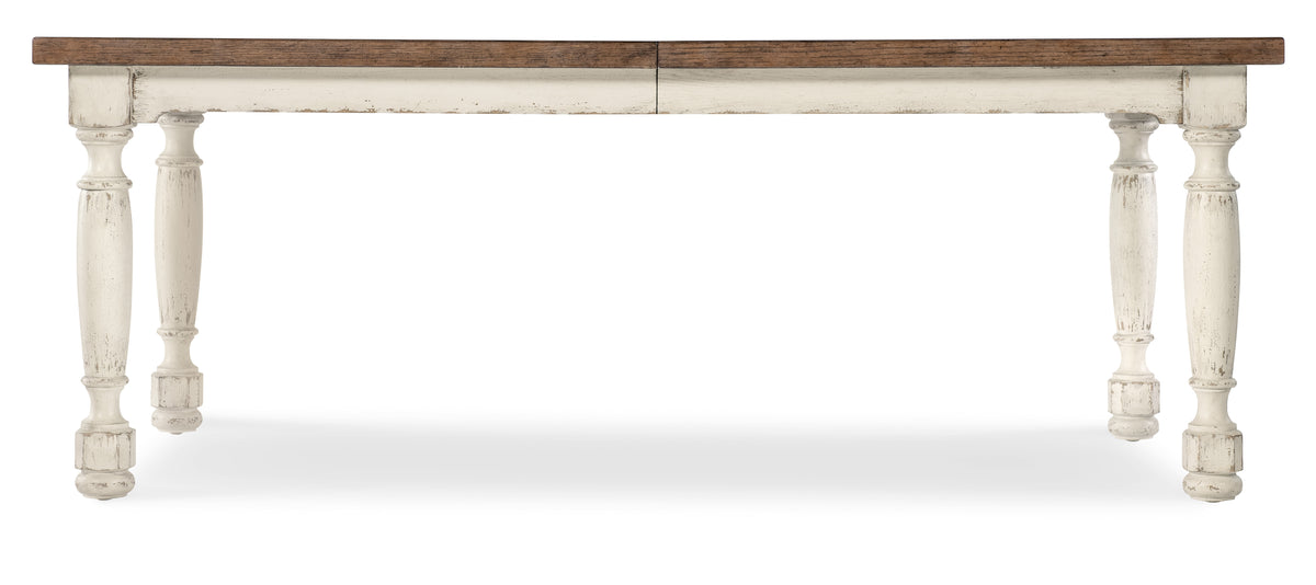 a table with a white and brown surface