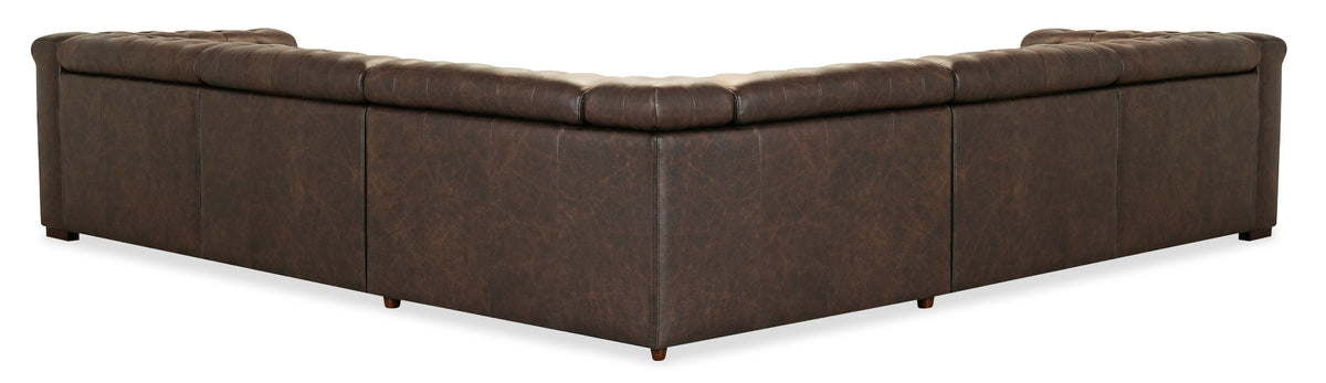 a brown leather corner chair