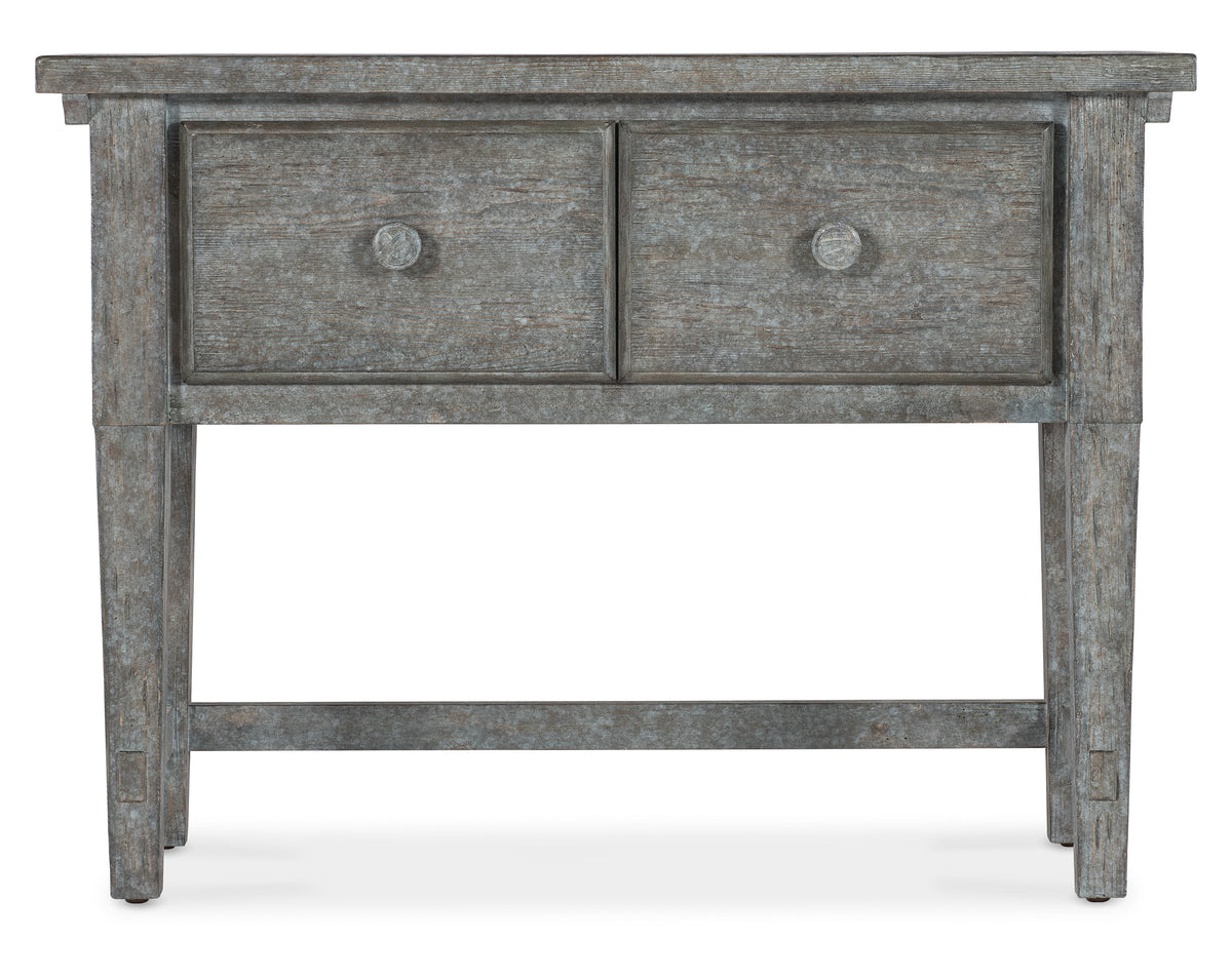 a wooden table with drawers