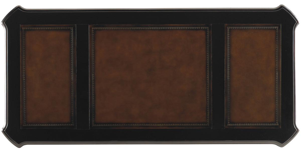 a brown leather and black frame