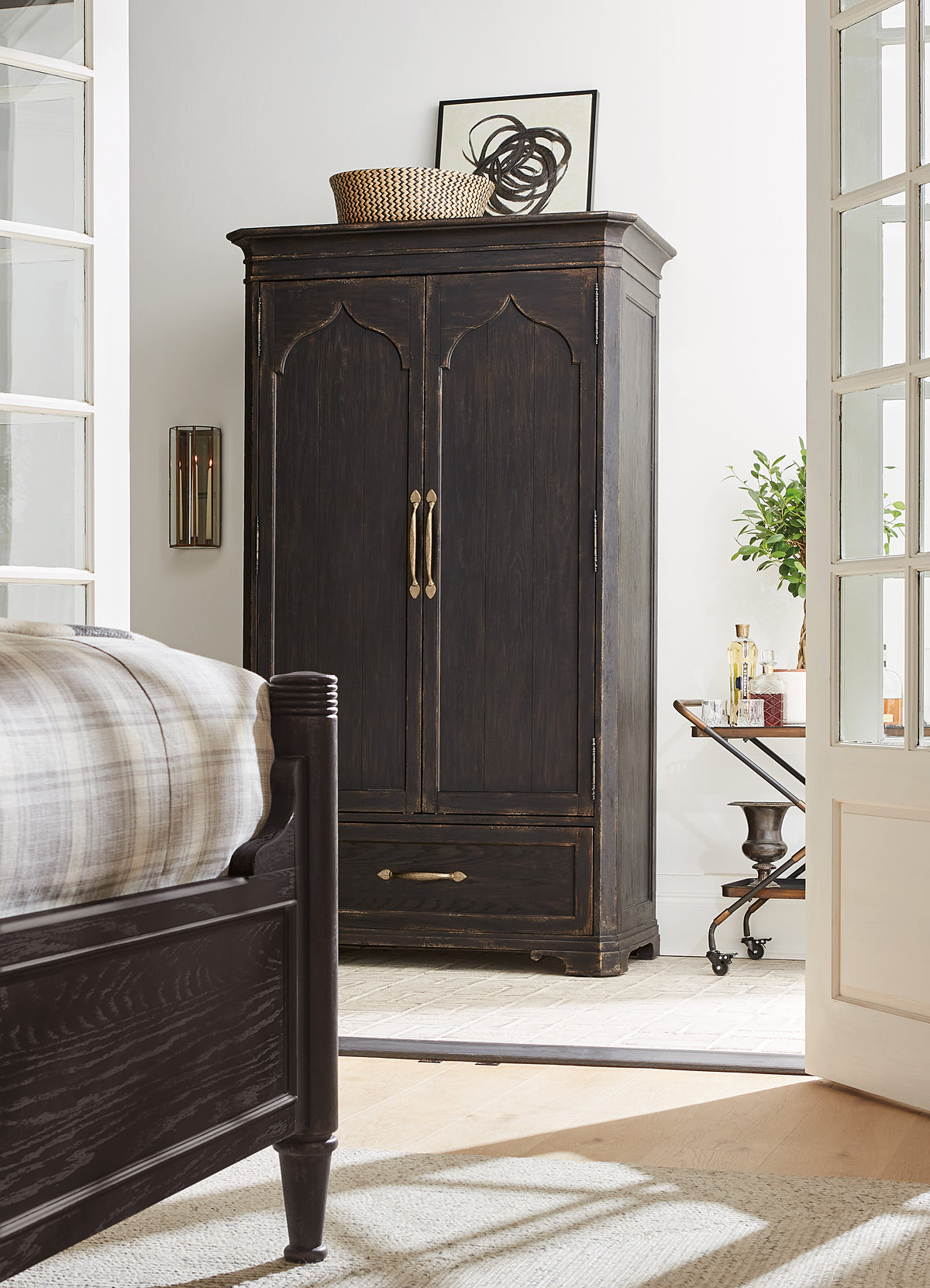 a dark wooden cabinet in a room
