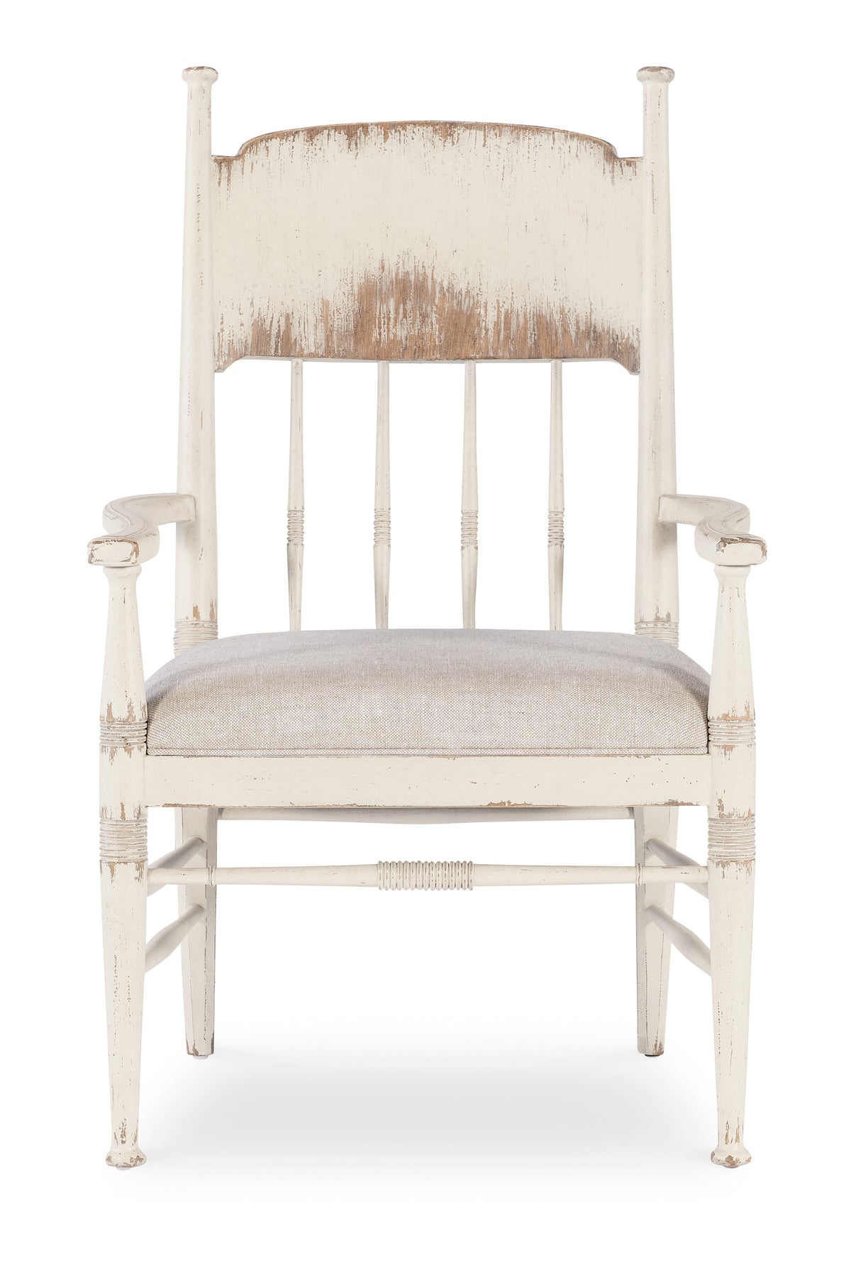 a white chair with a brown cushion