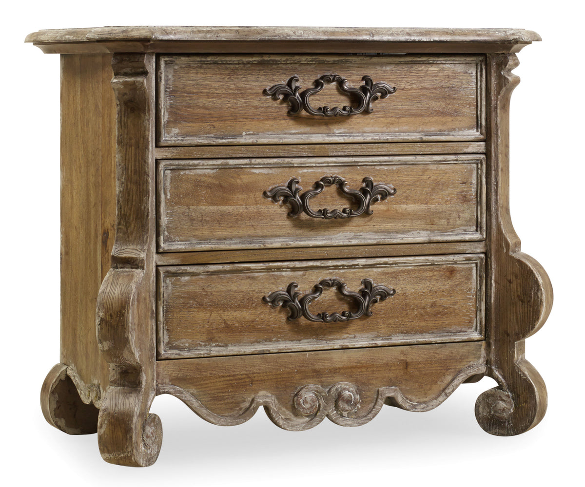a wooden dresser with three drawers