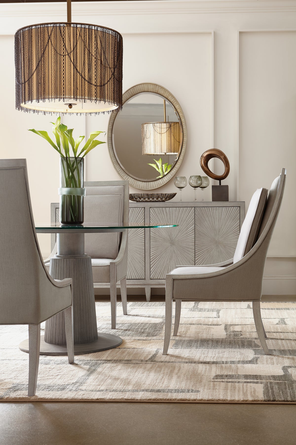 a room with a mirror and chairs