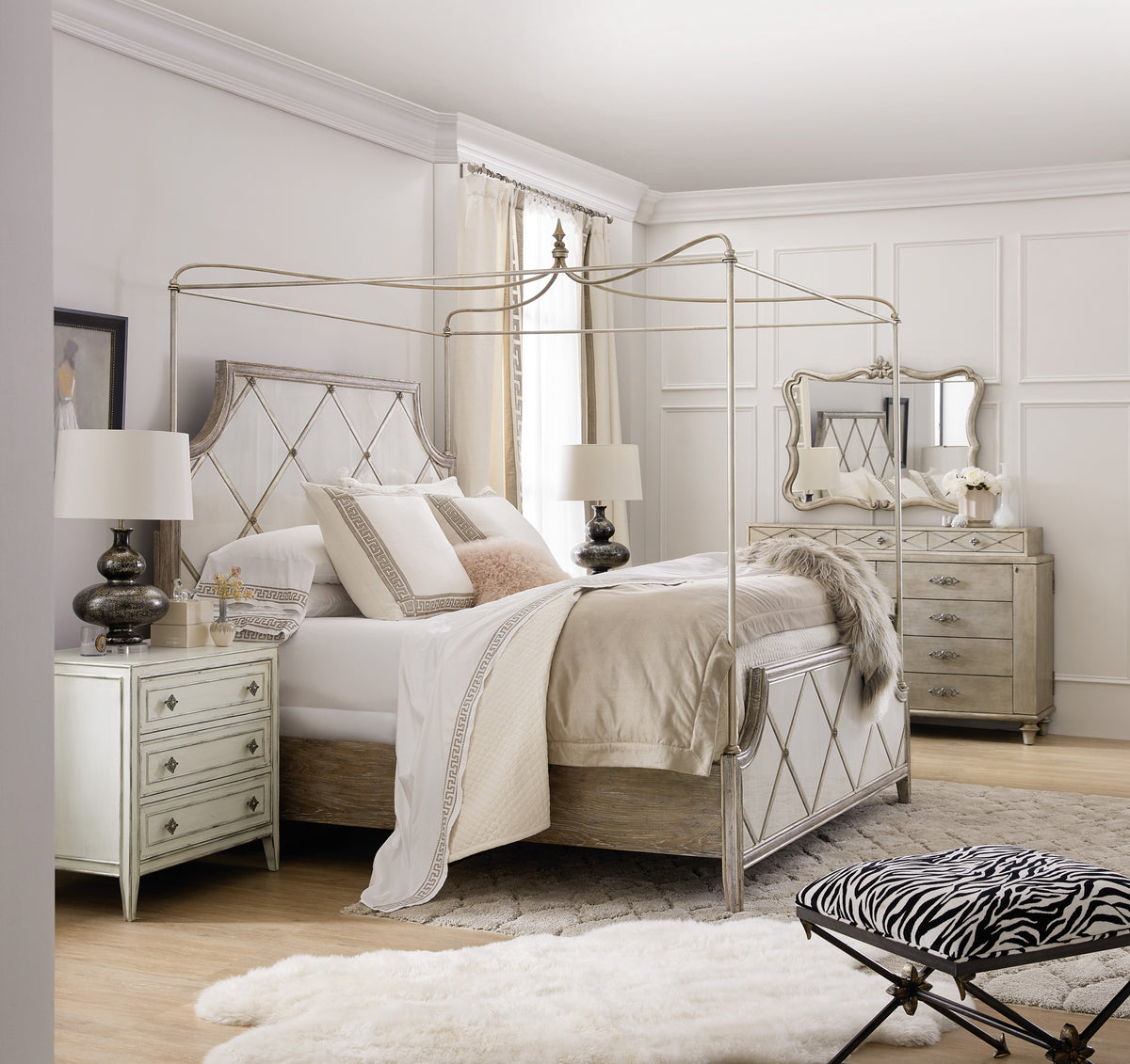 a bedroom with a four poster bed