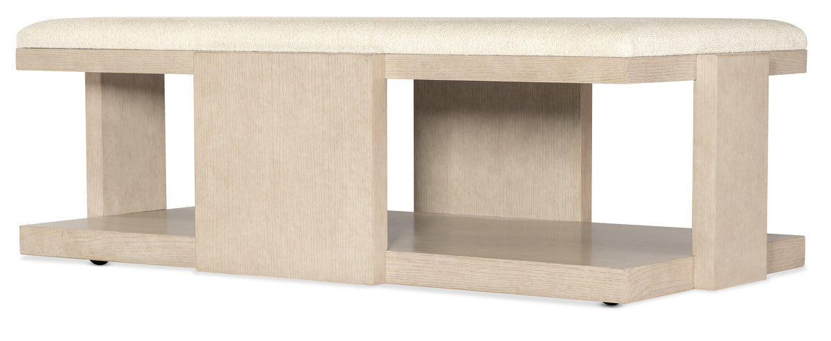 a white shelf with a white cushion