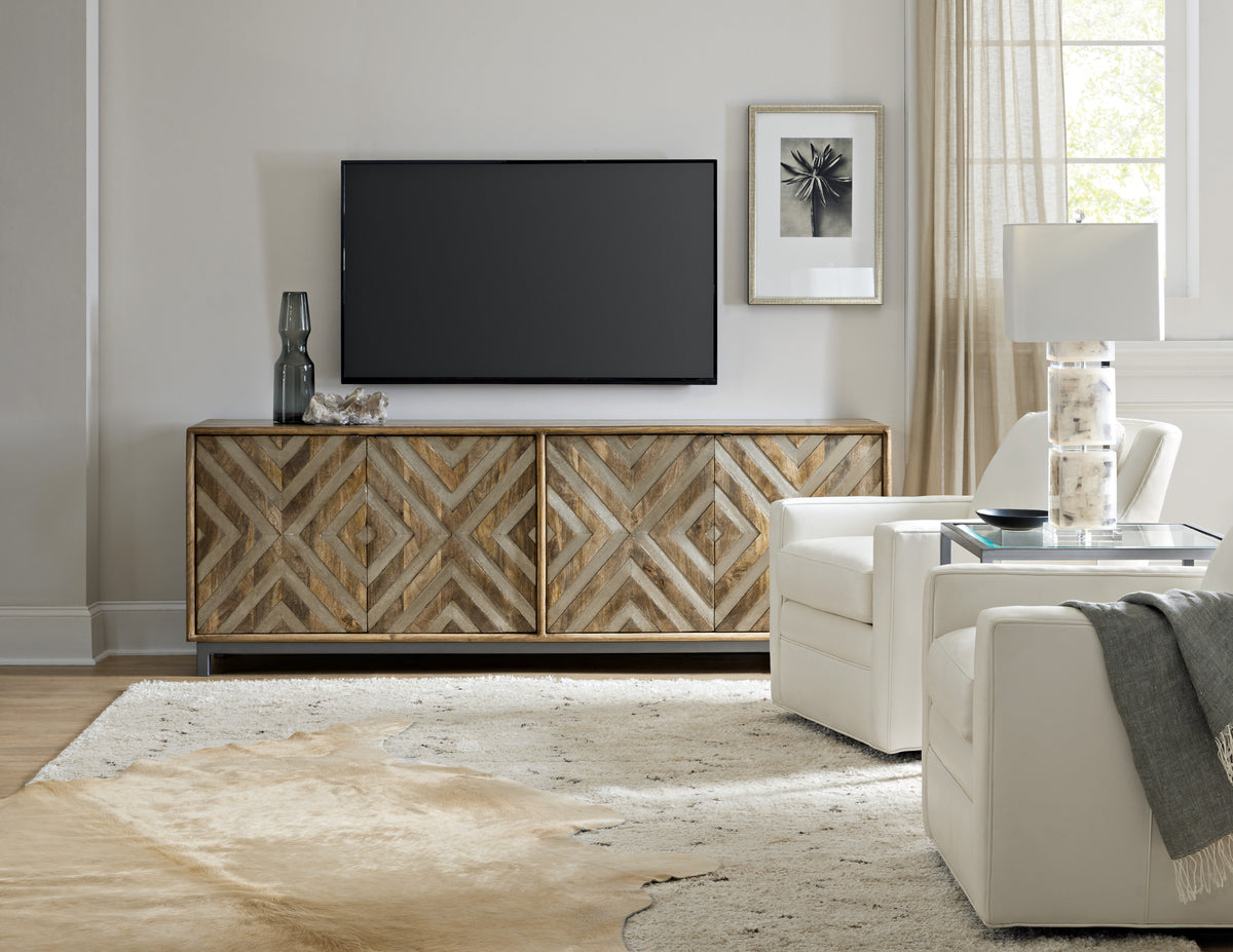 a living room with a tv on the wall