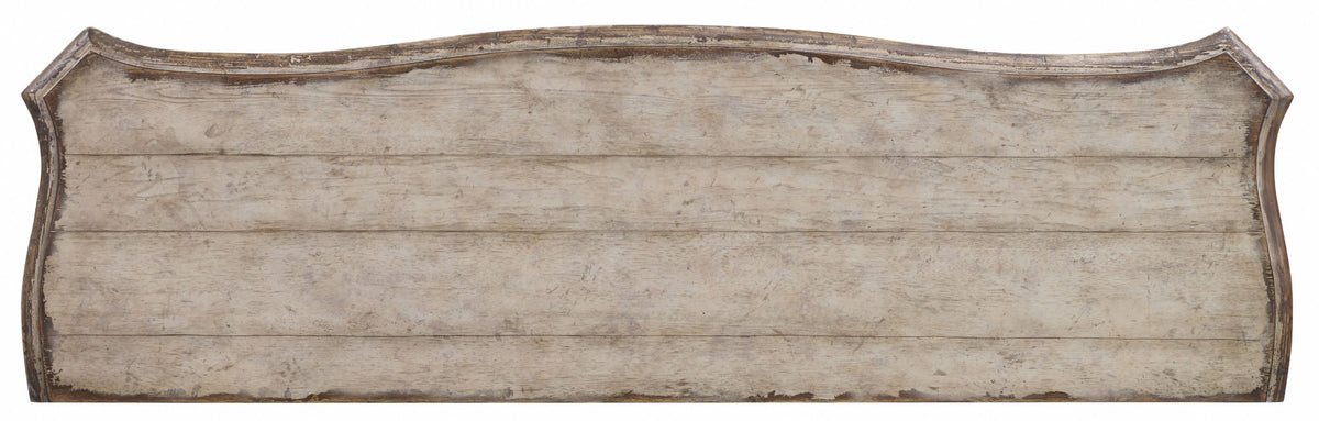 a wooden board with a curved edge