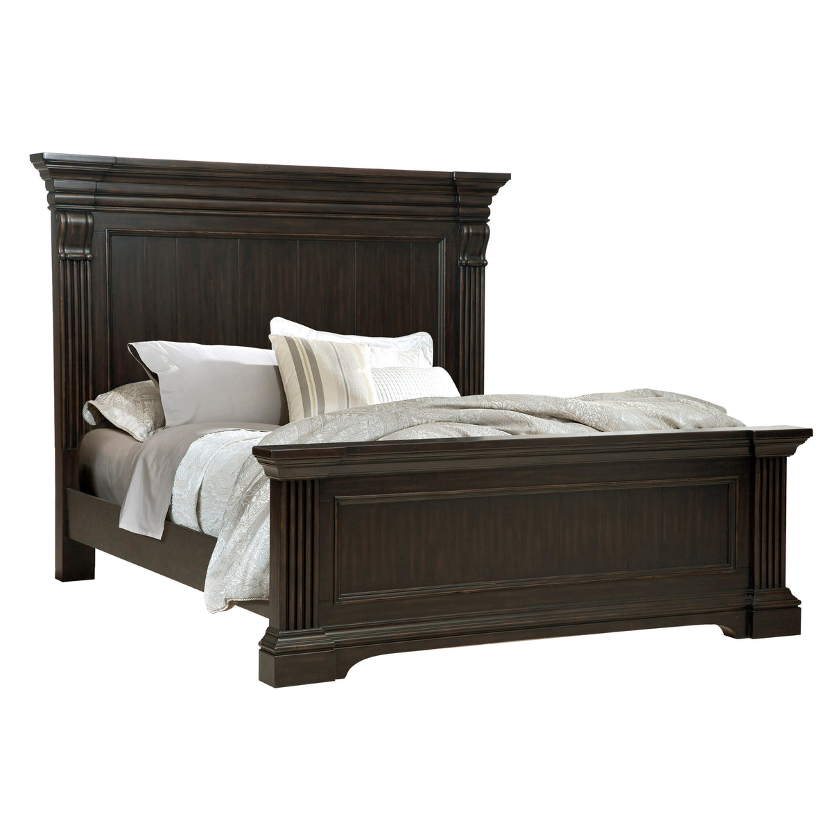 a bed with a white cover