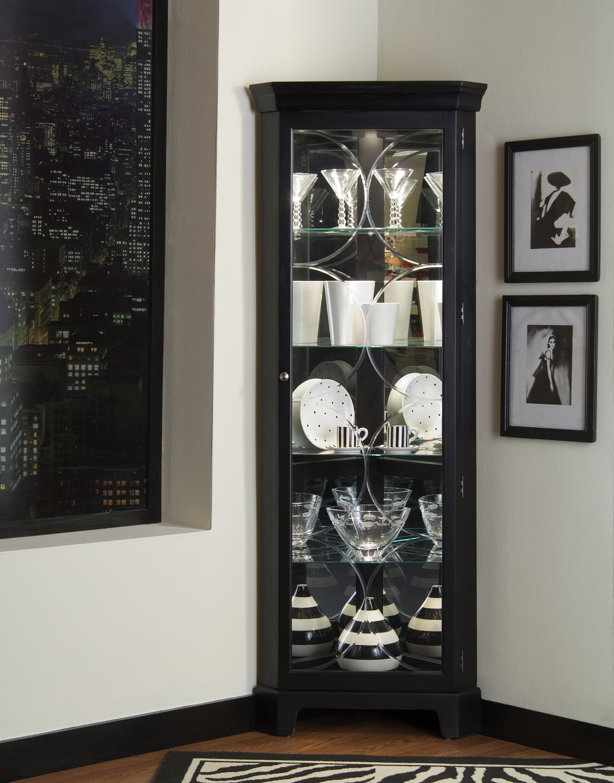 a black and white display cabinet with glass doors