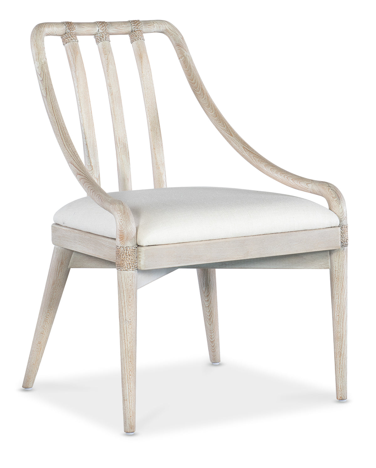 a white chair with a white cushion