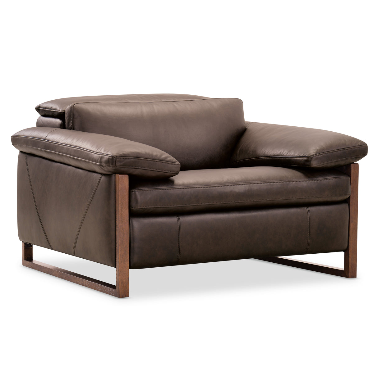 a brown leather chair with wooden legs