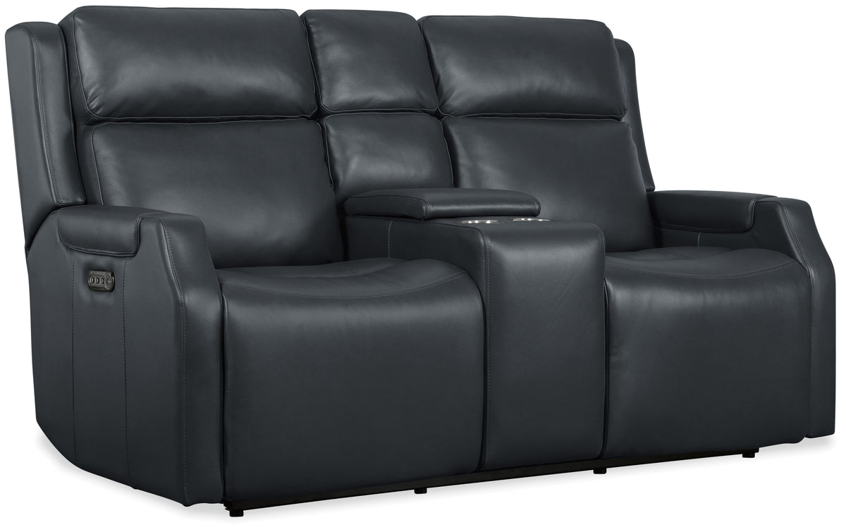 a black leather couch with arm rest