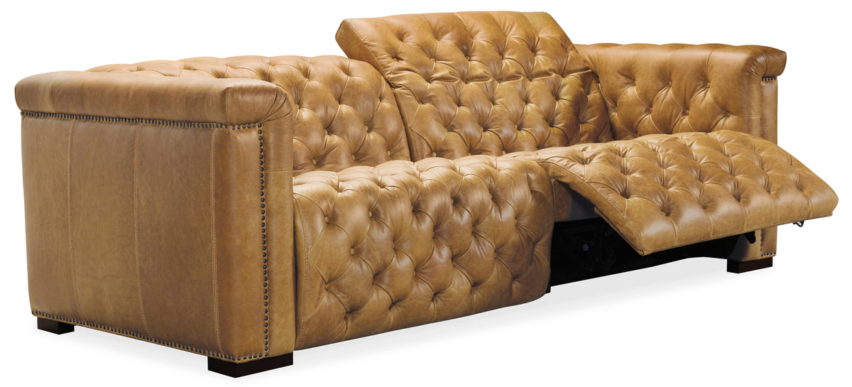 a brown leather couch with a hidden compartment