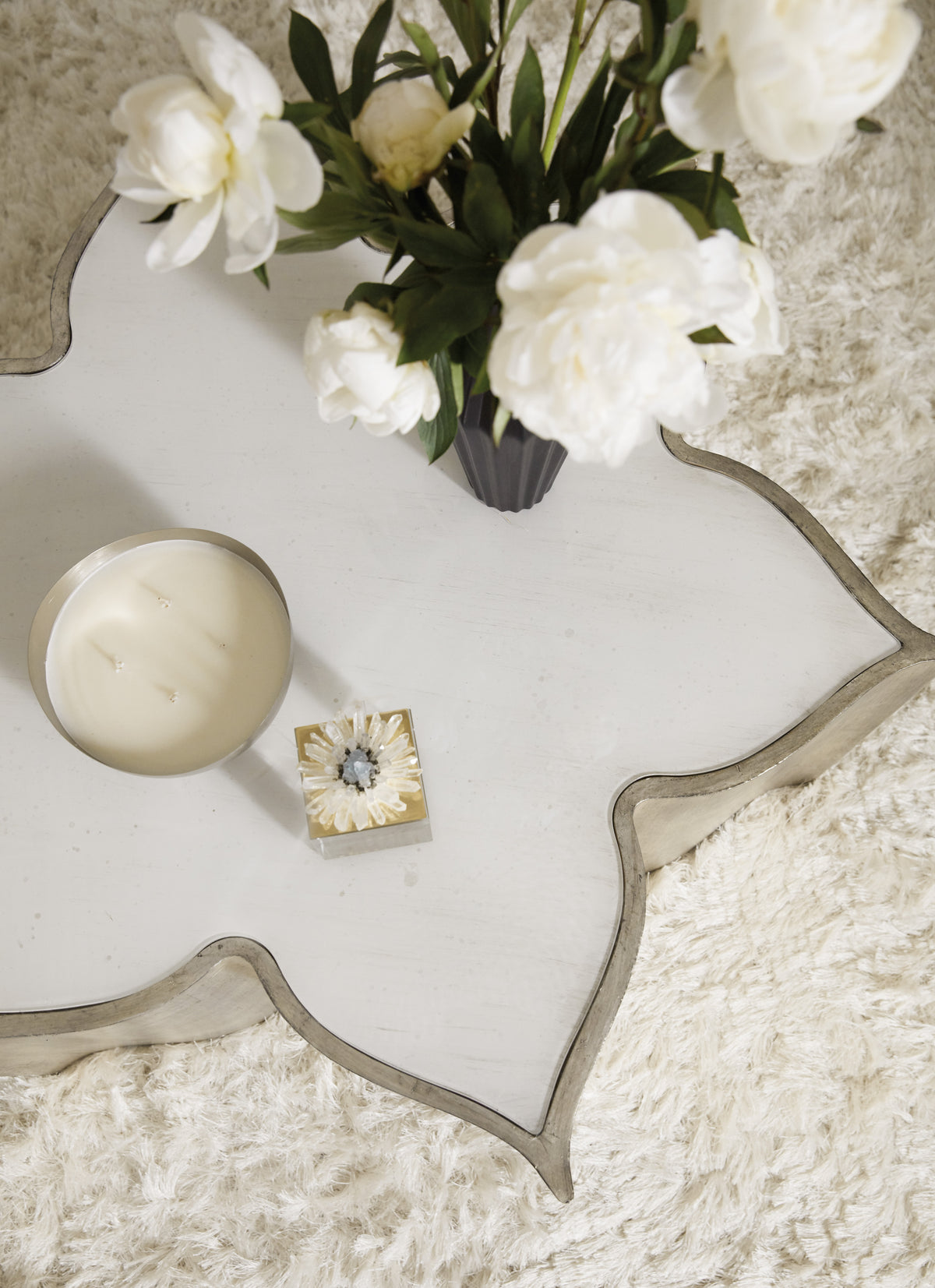 a white flowers on a white surface