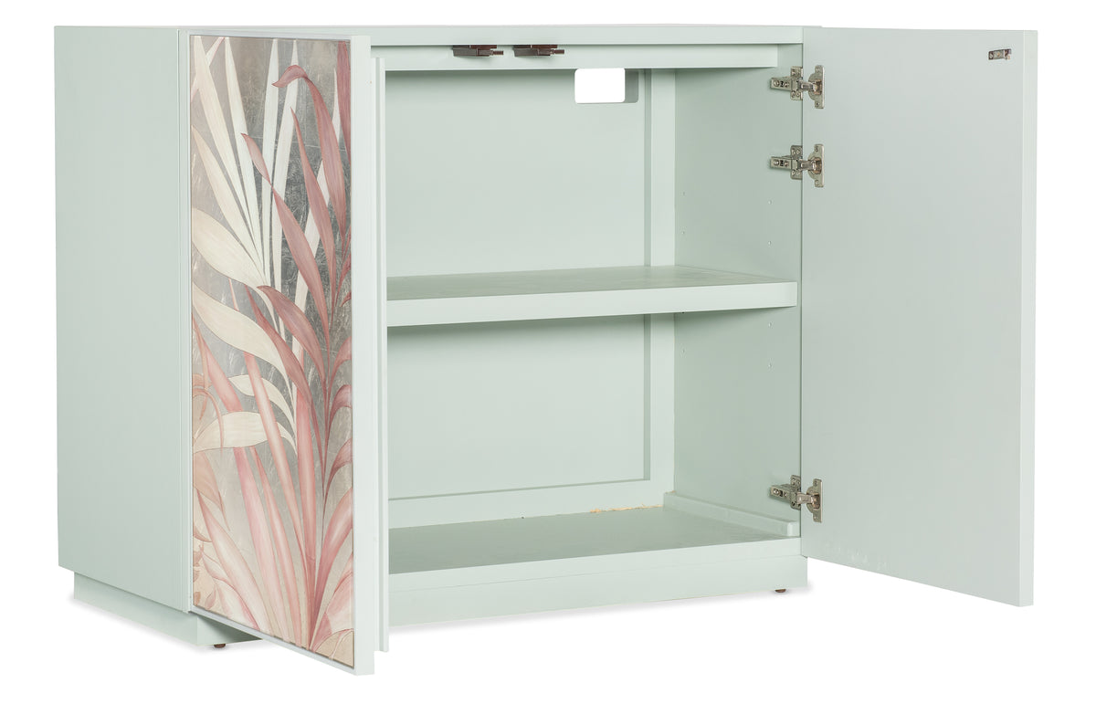 a white cabinet with a floral design