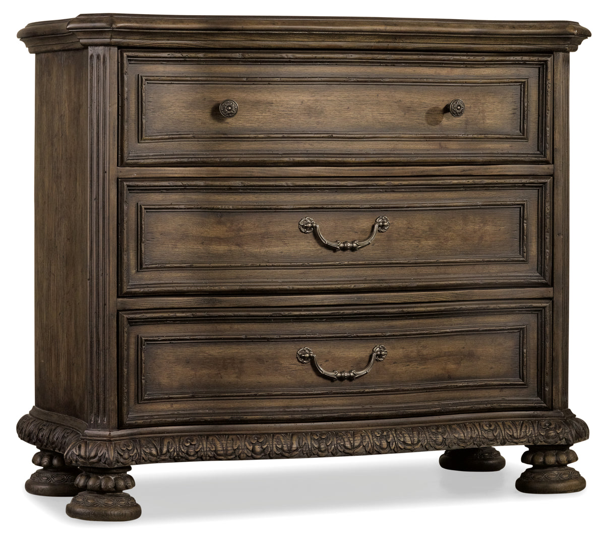 a wooden dresser with a carved edge