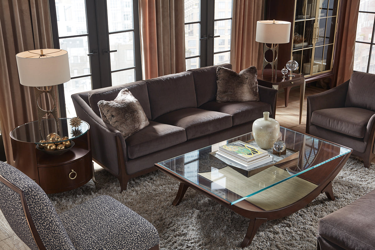 a living room with a couch and coffee table