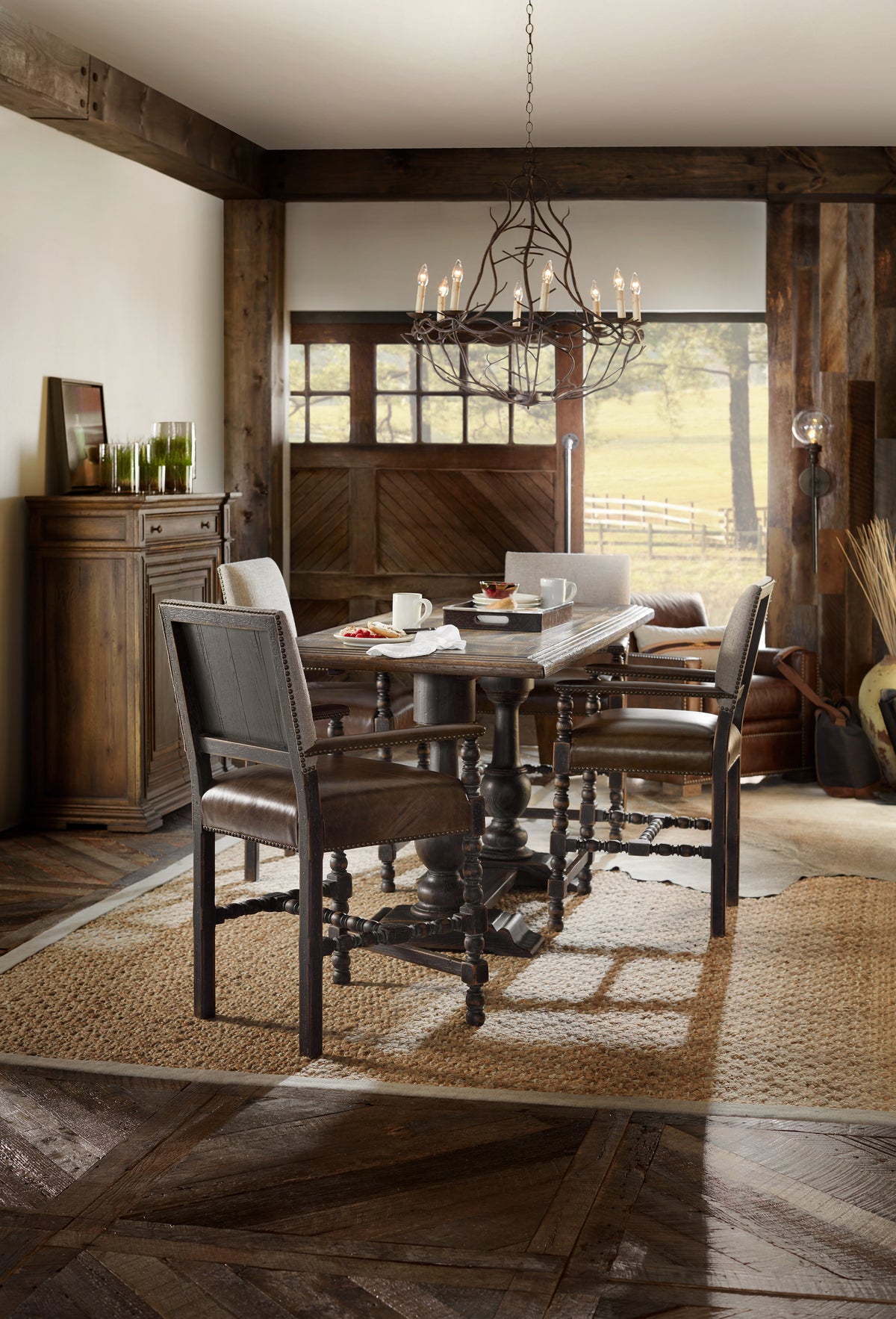 a dining table and chairs in a room