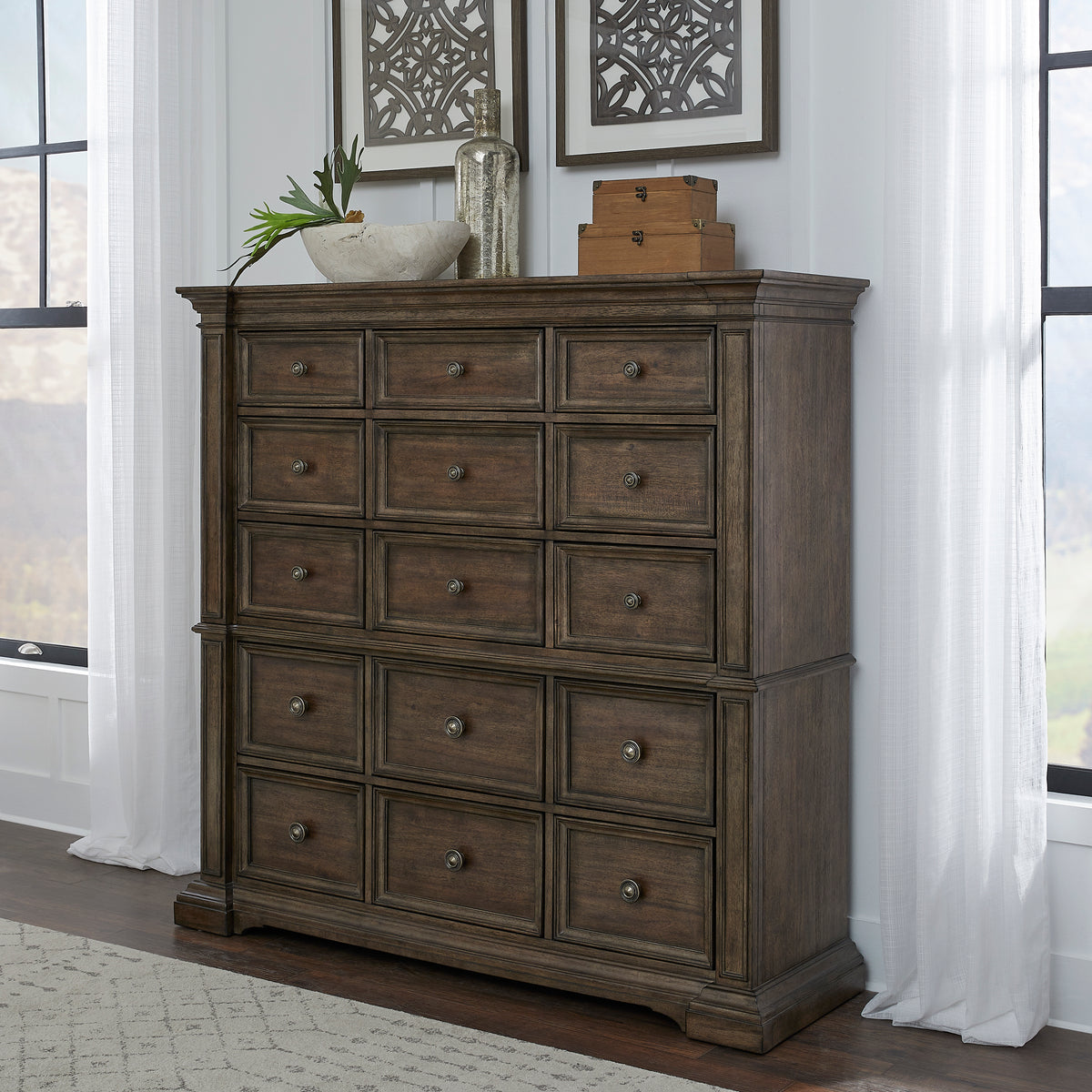 a dresser with a plant on top