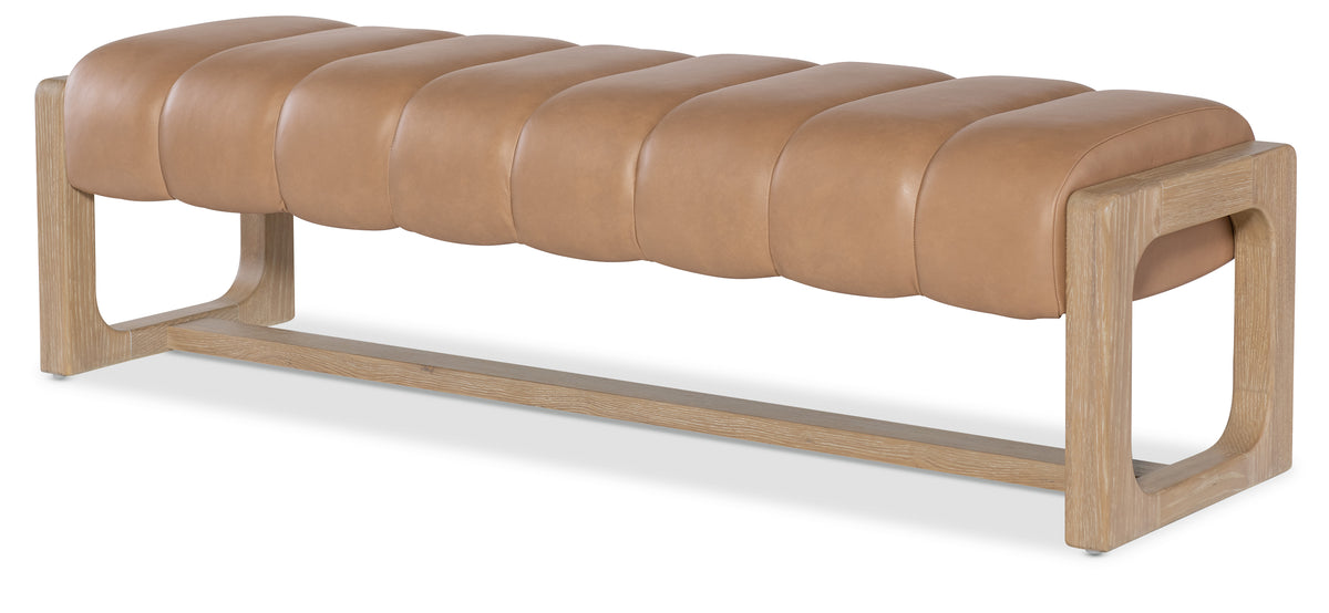 a brown leather bench with a white background