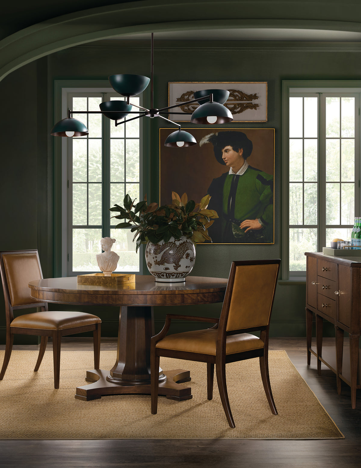 a dining room with a table and chairs
