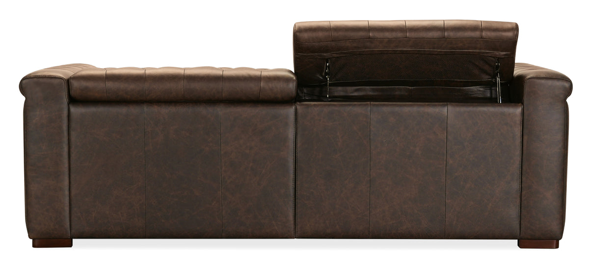 a brown leather couch with armrests
