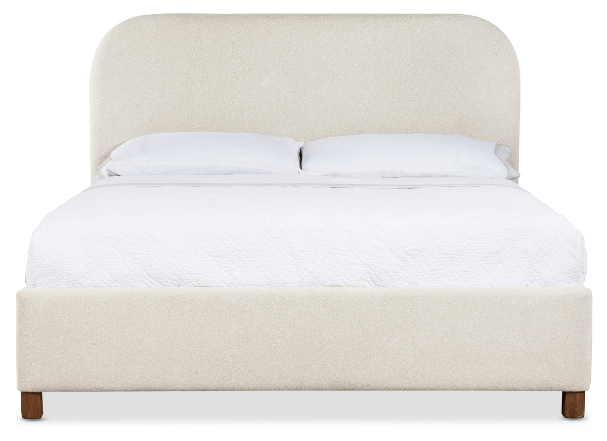 a bed with pillows on it