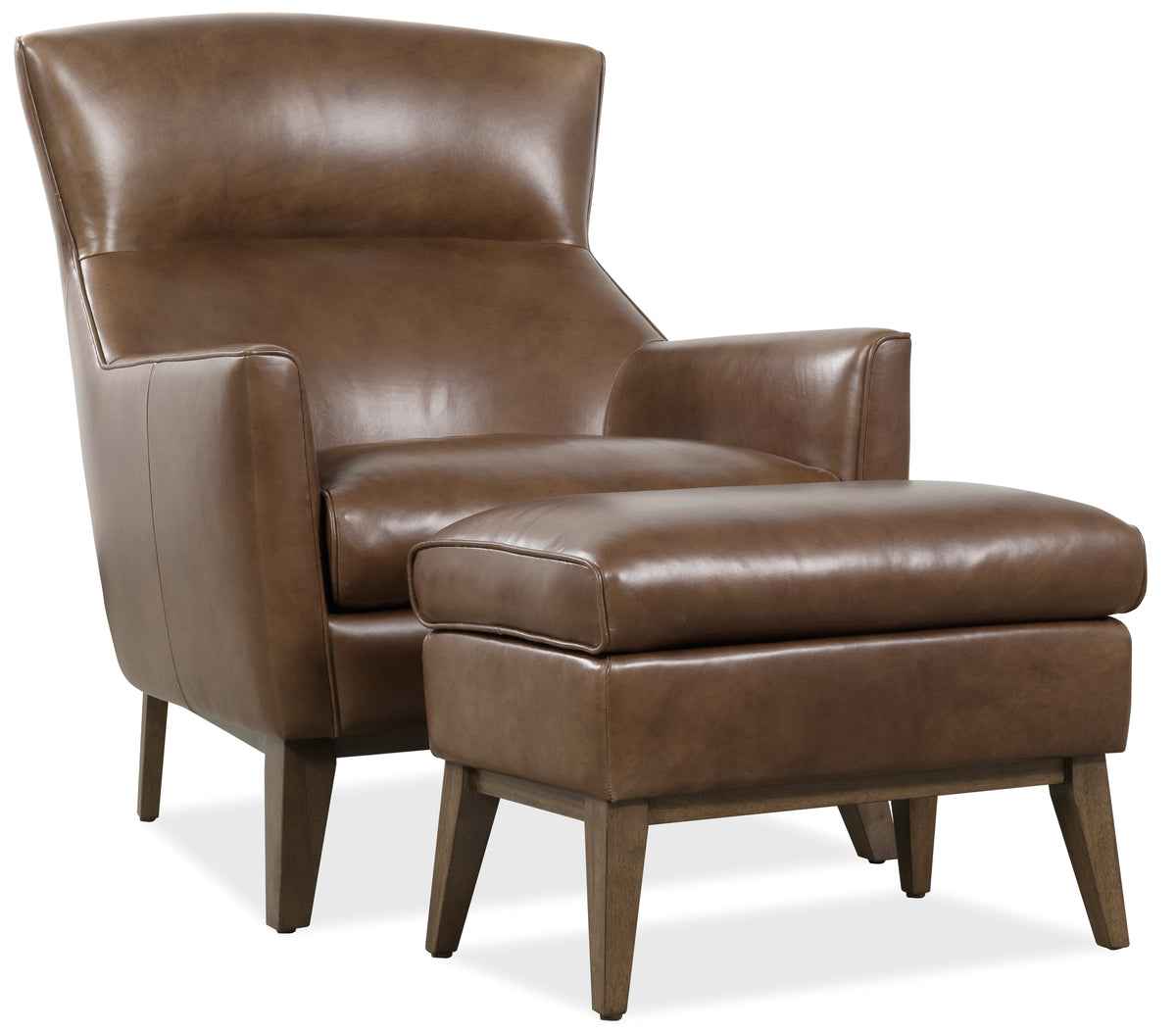a brown leather chair and ottoman