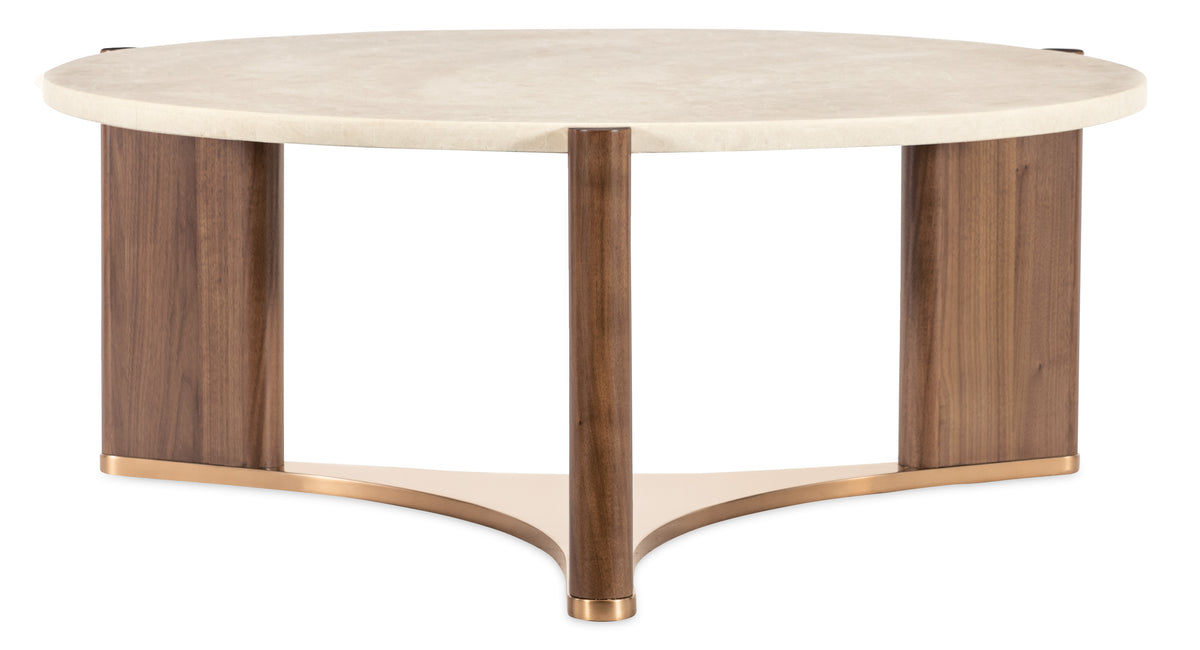 a round white table with brown legs