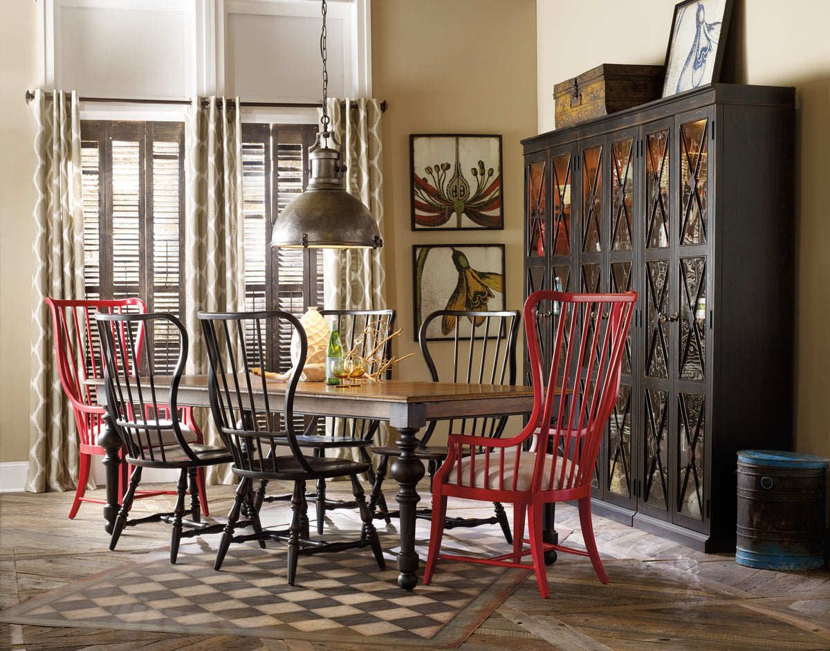 a room with a table and chairs