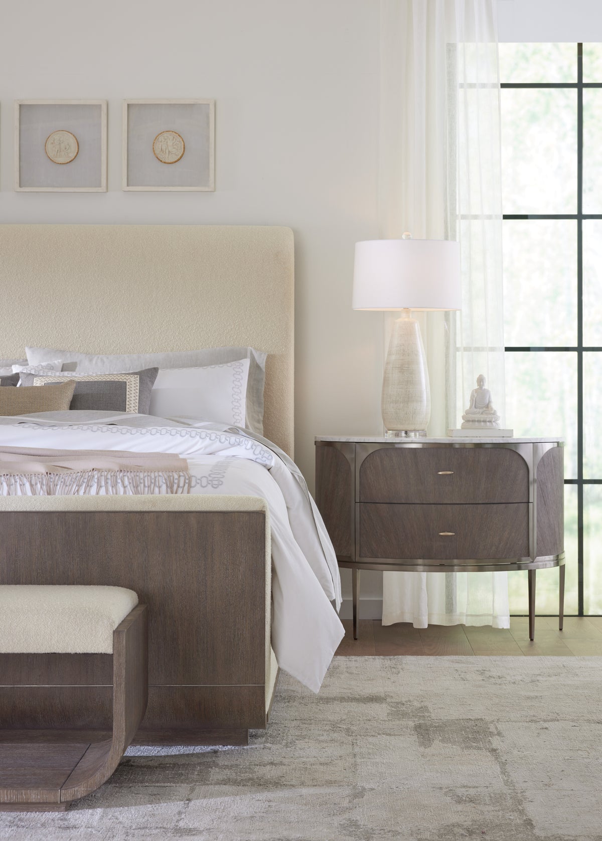 a bedroom with a bed and a nightstand