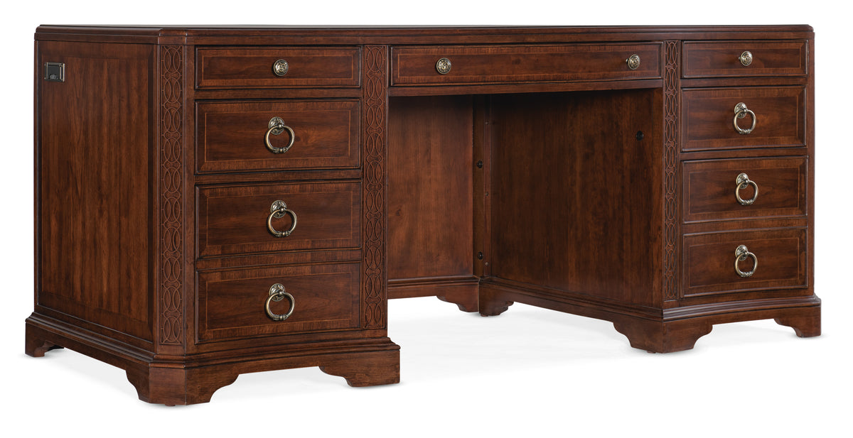 a wooden desk with drawers