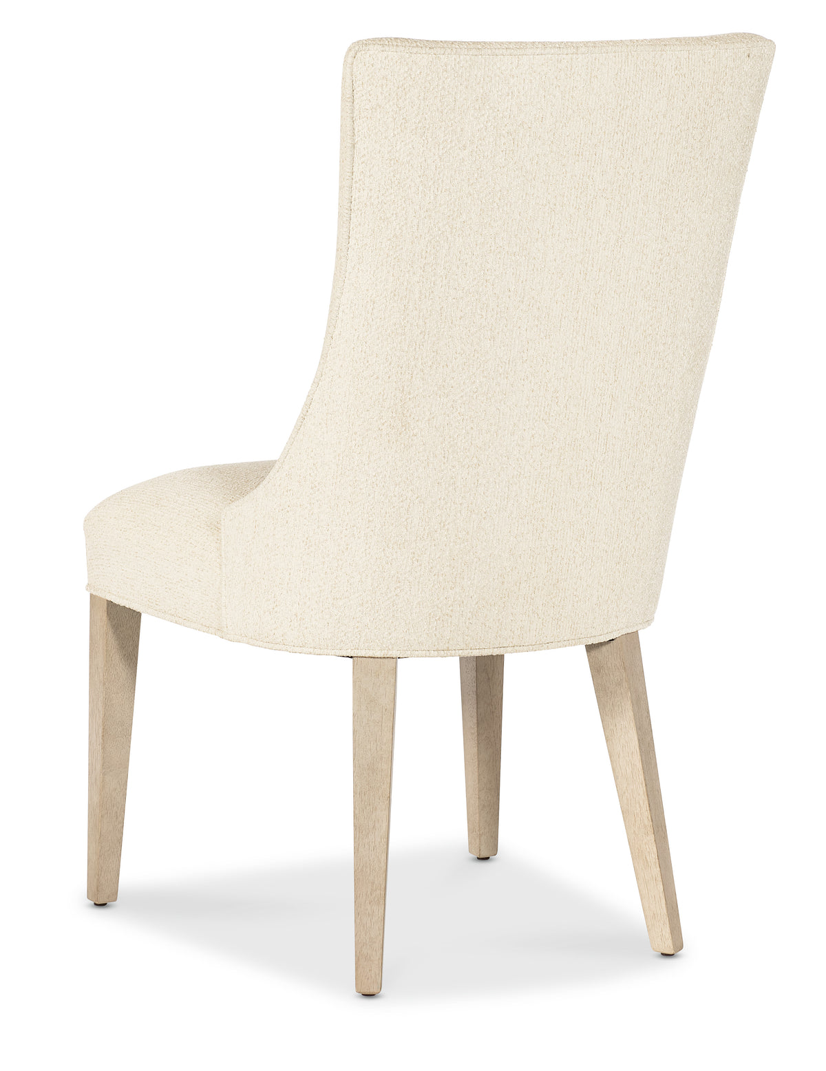 a white chair with wooden legs