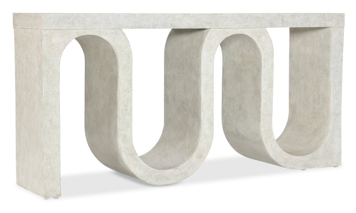 a white stone table with curved lines
