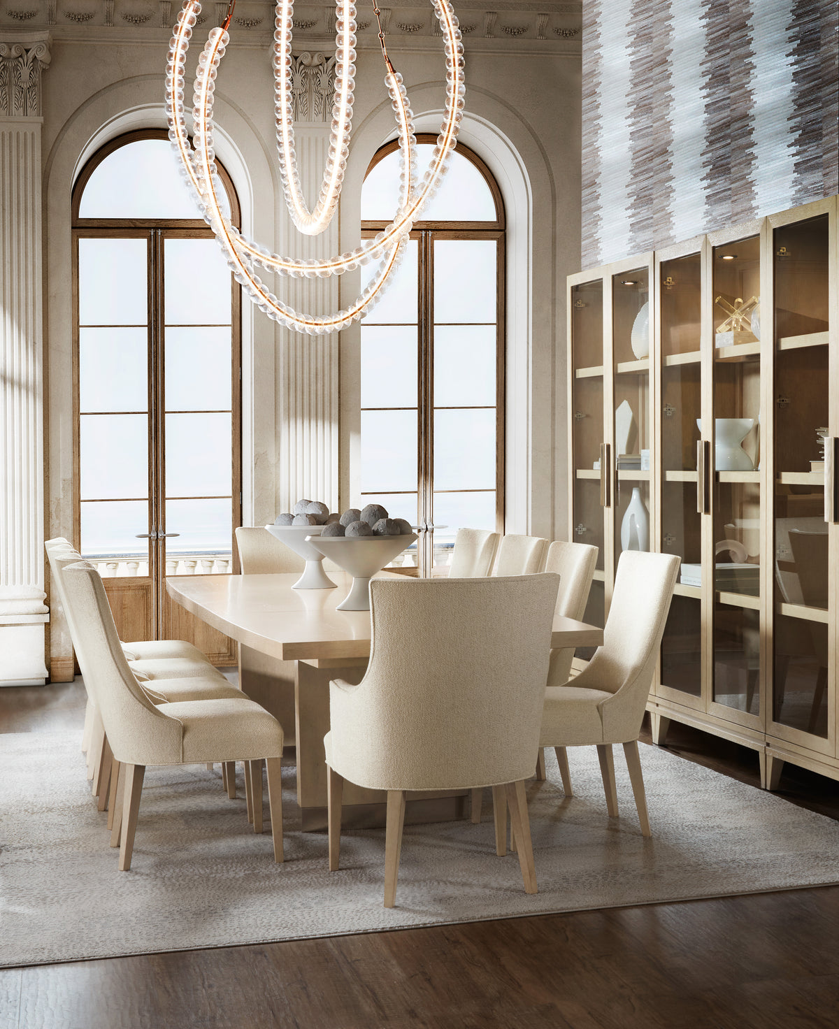 a dining room with a chandelier and a table