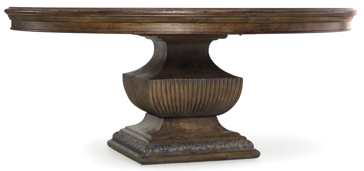 a wooden table with a carved base