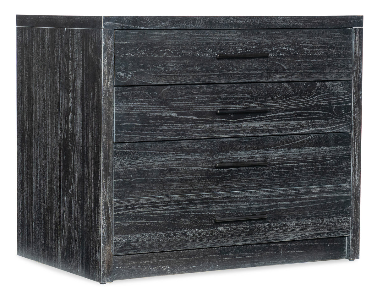 a black dresser with three drawers