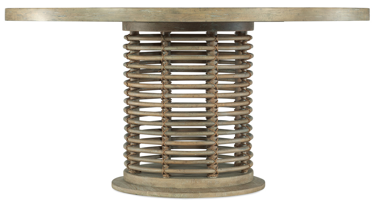 a wooden table with a round top