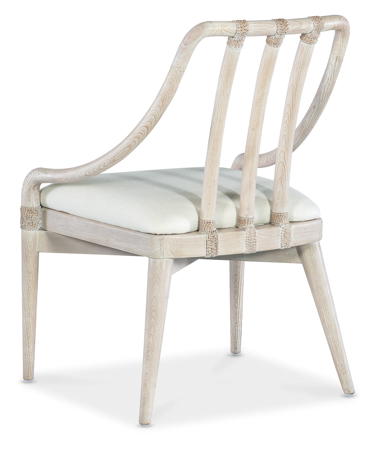 a white chair with a cushion