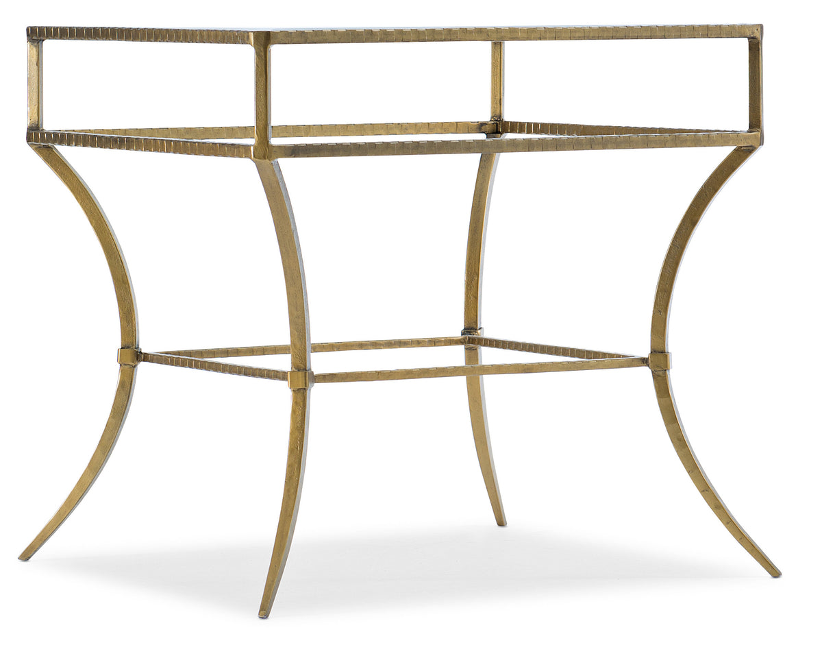a gold metal table with a white background