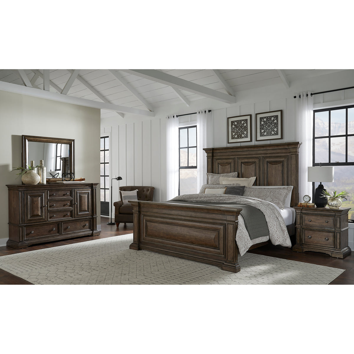 a bedroom with a bed and a dresser
