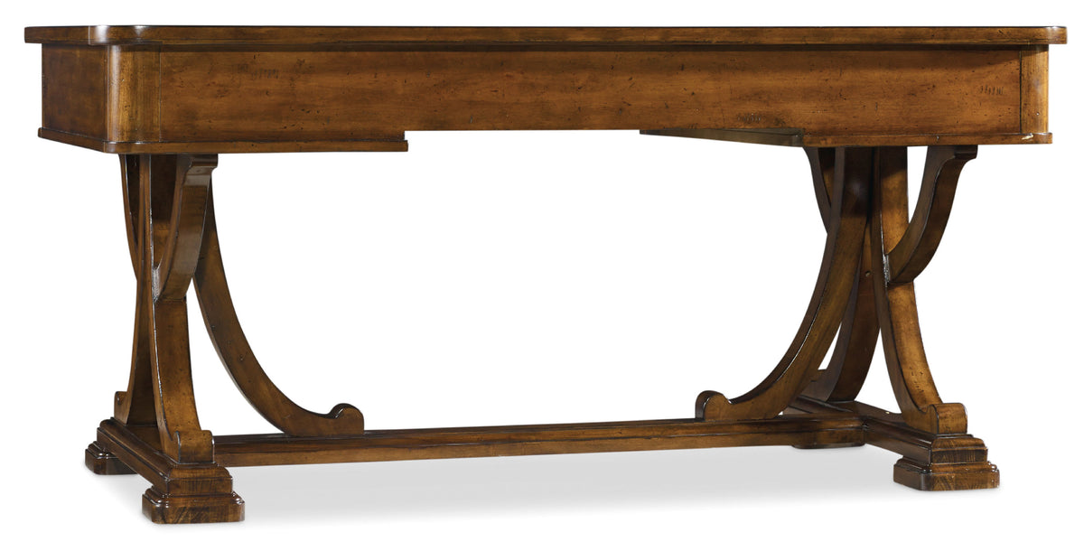 a wooden table with curved legs
